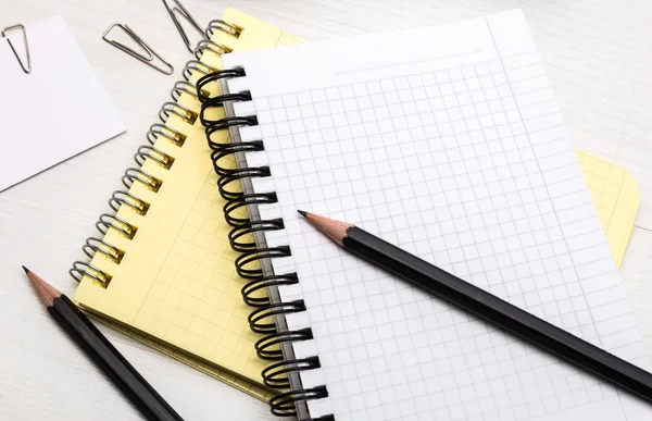 Blank notebook and pencils — Stock Photo, Image