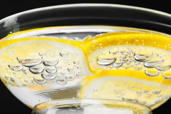 Pieces of lemon in a wine glass — Stock Photo, Image