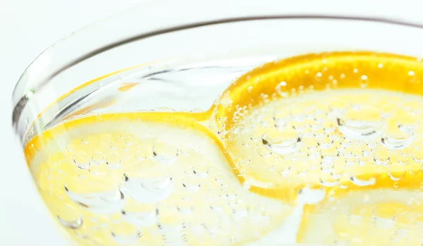 Lemon in glass — Stock Photo, Image