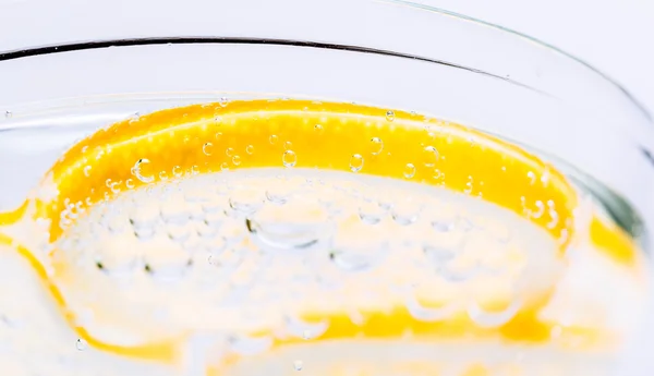 Lemon in glass — Stock Photo, Image
