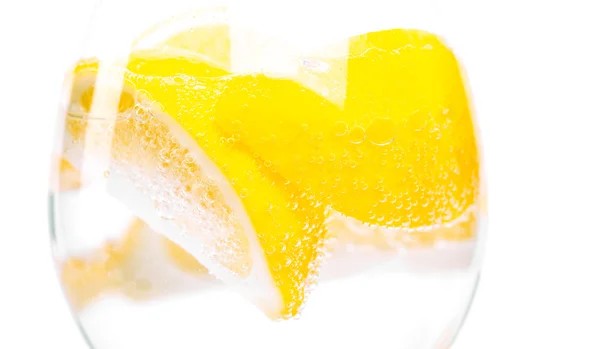 Lemon in glass — Stock Photo, Image