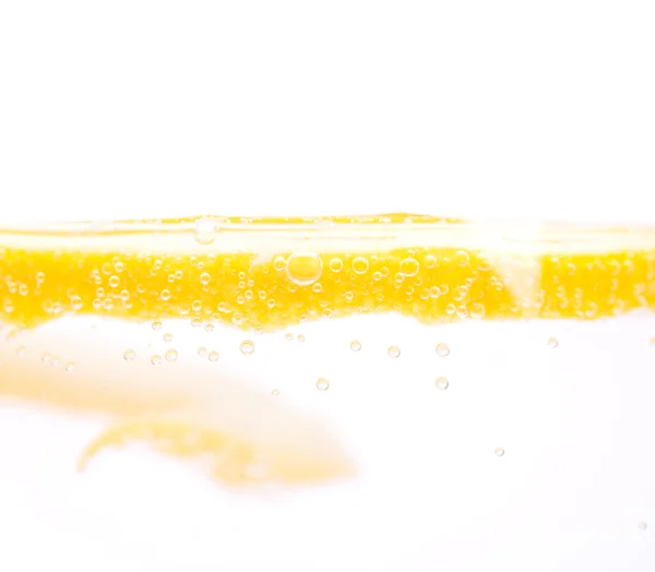 Limón en vidrio — Foto de Stock