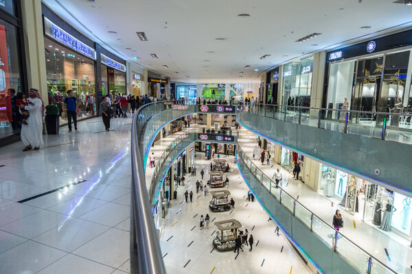 DUBAI, UAE - DECEMBER 5, 2015: Shoppers in Dubai Mall, UAE. December 5, 2015 in Dubai, United Arab Emirates