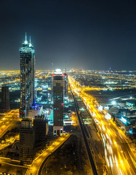 Panorama de Dubai à noite — Fotografia de Stock