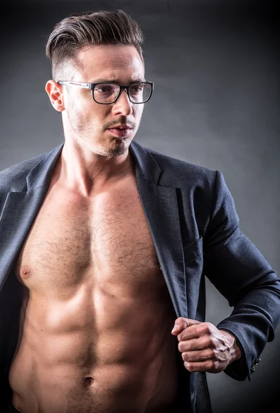 Muscular young man in glasses — Stock Photo, Image