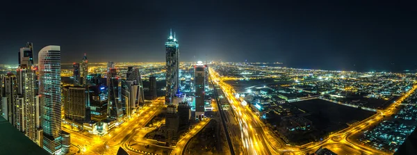 Panorama av Dubai om natten – stockfoto