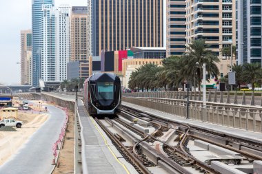 New modern tram in Dubai, UAE clipart