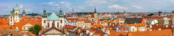 Panoramic cityscape of Prague in a summer day