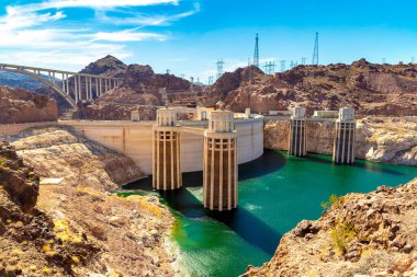 Hoover Dam and penstock towers in Colorado river at Nevada and Arizona border, USA clipart