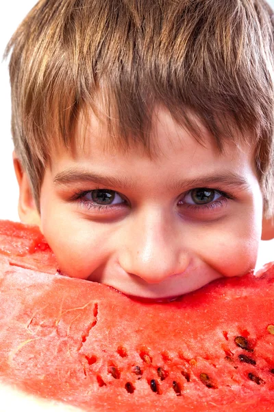 เด็กชายกินแตงโม — ภาพถ่ายสต็อก