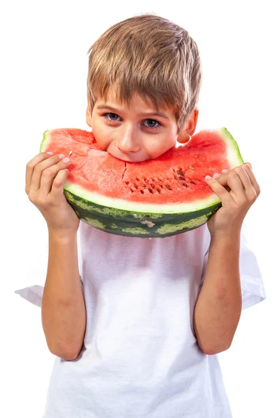 เด็กชายกินแตงโม — ภาพถ่ายสต็อก