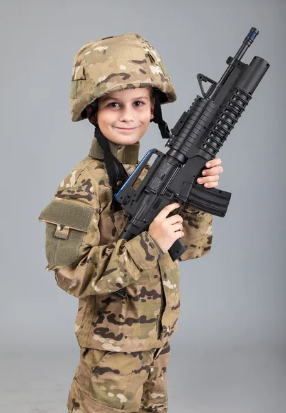 Fiú öltözött, mint katona — Stock Fotó