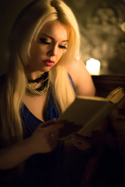 Girl with old book — Stock Photo, Image