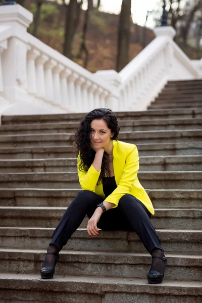 Beautiful Woman on staircase — Stock Photo, Image