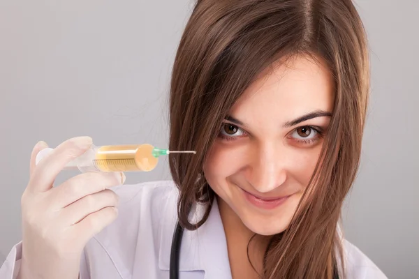 Doctor with filled syringe — Stock Photo, Image