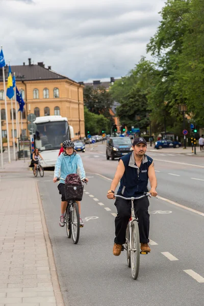 Bicyclists on nice bikes