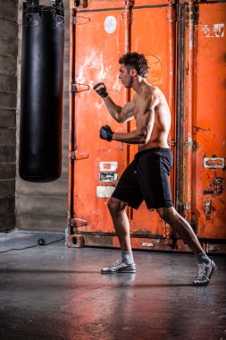 Young man boxing workout clipart