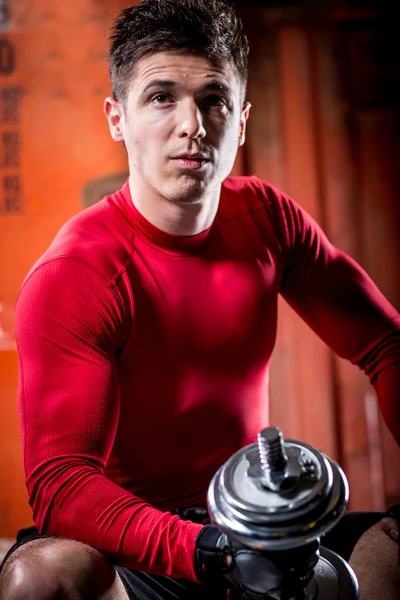 Muscular man with dumbbell — Stock Photo, Image