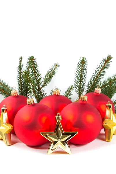 Red Christmas balls and fir branch — Stock Photo, Image