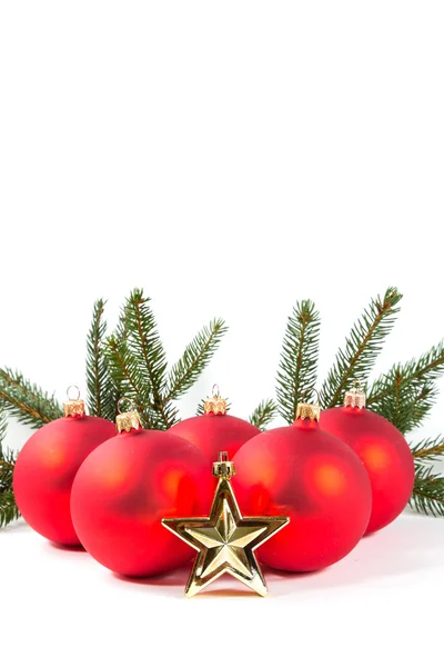 Red Christmas balls and fir branch — Stock Photo, Image