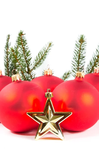 Red Christmas balls and fir branch — Stock Photo, Image