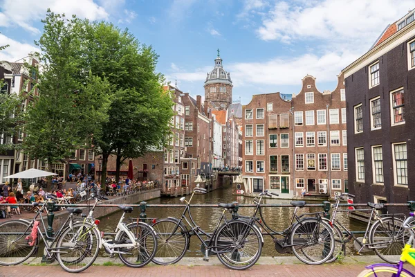 Bicycles on a bridge over canal — Stock Photo, Image