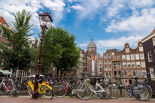 Bicycles on a bridge over canal — Stock Photo, Image