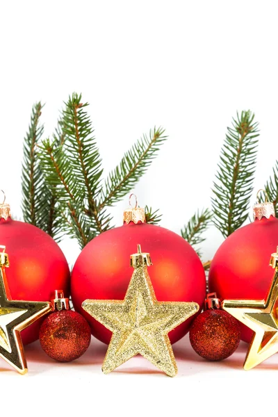 Red Christmas balls and fir branch — Stock Photo, Image