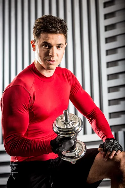 Muscular man with dumbbell — Stock Photo, Image