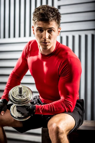 Muscular man with dumbbell — Stock Photo, Image