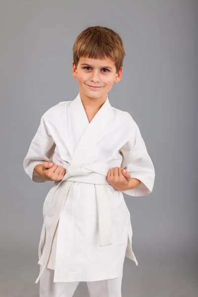 Karate boy in white kimono — Stock Photo, Image