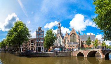 Old Church and Voorburgwal canal in Amsterdam