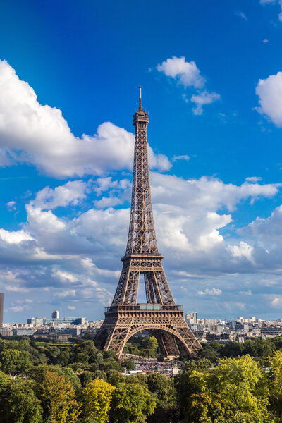 Aerial view of the Eiffel Tower in beautiful summer day in Paris, France