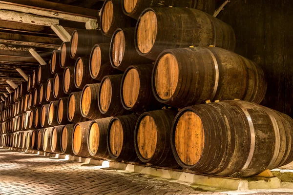 Barrels in  wine cellar in Porto — Zdjęcie stockowe