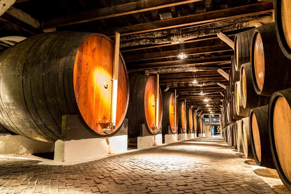 Barrels in  wine cellar in Porto — Stockfoto