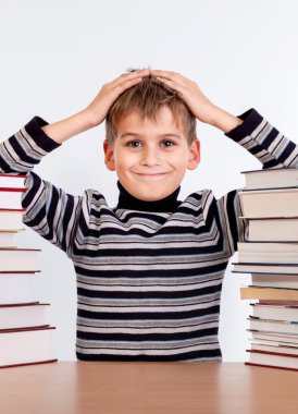 öğrenci ve bir yığın kitap