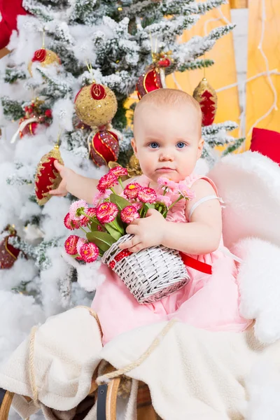 Little girl with gifts — Stock Photo, Image