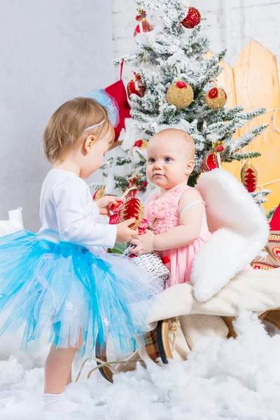 Little baby girls with gifts — Stock Photo, Image