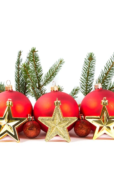 Red Christmas balls and fir branch — Stock Photo, Image