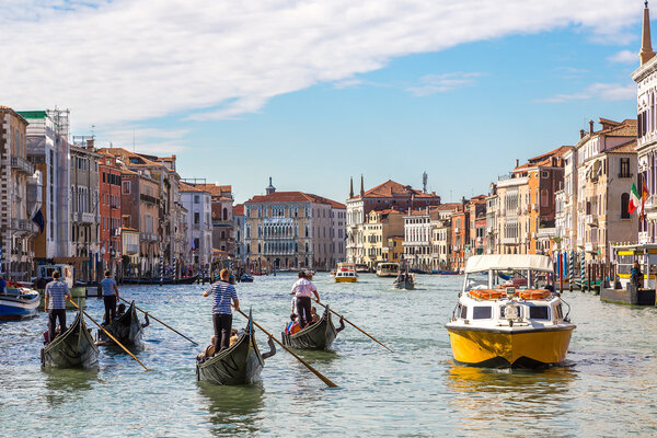 Gondolas on Canal Grande in summer day