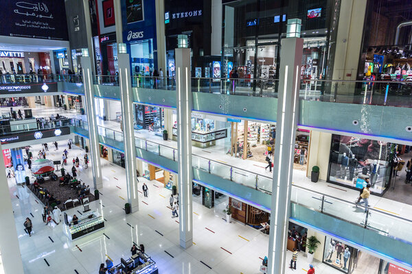 DUBAI, UAE - DECEMBER 5, 2015: Shoppers in Dubai Mall, UAE. December 5, 2015 in Dubai, United Arab Emirates