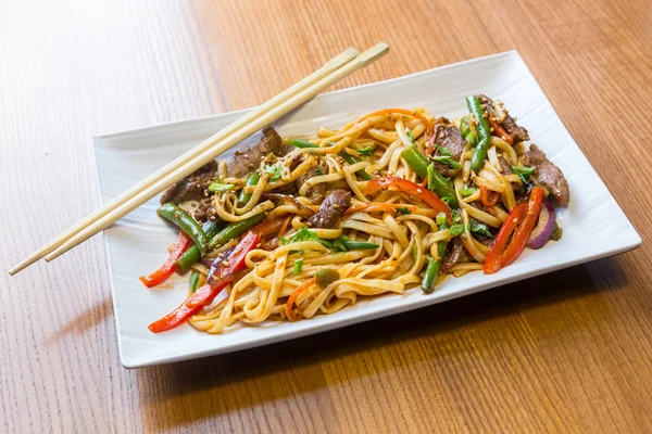 Udon noodles with beef in asian restaurant Stock Image