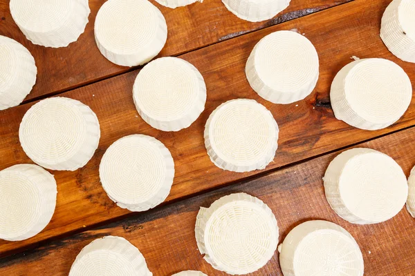 Salty soft goat cheese heads — Stock Photo, Image