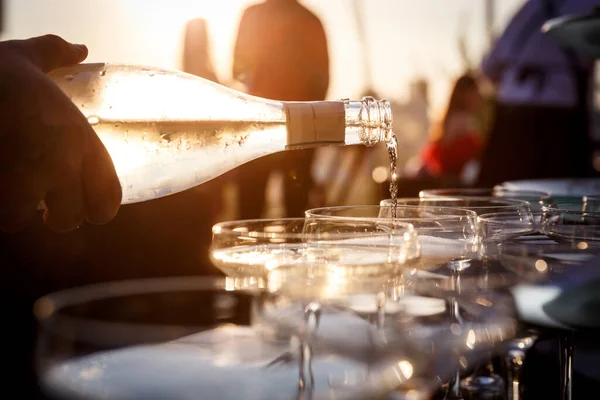 Sunset Closeup View Waiter Hand Pouring Sparkling Wine Glasses Party — Stok fotoğraf