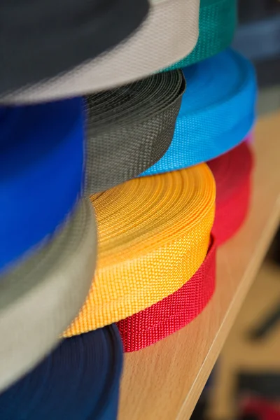 Color rolls with synthetic fabric straps — Stock Photo, Image