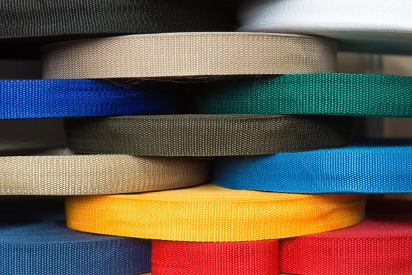 Color rolls with synthetic fabric straps — Stock Photo, Image