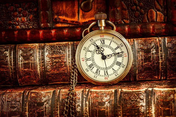 Old Books and Vintage pocket watch — Stock Photo, Image