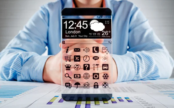 Smartphone con pantalla transparente en manos humanas . — Foto de Stock