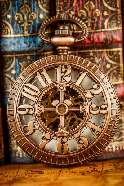 Old Books and Vintage pocket watch — Stock Photo, Image