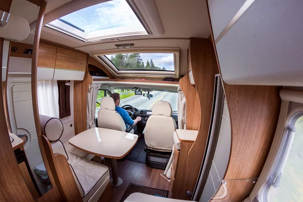 Man driving on a road in the Camper Van — Stock Photo, Image